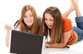 Two young happy student girl work on laptop Royalty Free Stock Photo