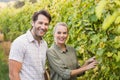 Two young happy vintners Royalty Free Stock Photo