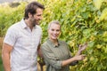 Two young happy vintners looking at camera Royalty Free Stock Photo