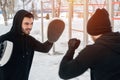 Two young male adults doing boxing workout Royalty Free Stock Photo