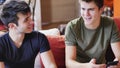 Two young men talking and chatting Royalty Free Stock Photo