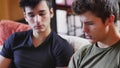 Two young men talking and chatting Royalty Free Stock Photo
