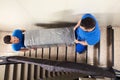 Two Movers Carrying Furniture On Staircase Royalty Free Stock Photo