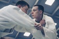 Young males practicing judo together.