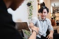 Two young man shake hands Royalty Free Stock Photo