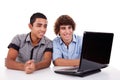 Two young man together on a laptop Royalty Free Stock Photo