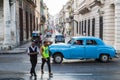 Trendy men cross the Prado