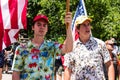 Young Men Dressed in Hawaiian Shirts Shout at a Conservative Rally