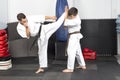 Two young men in kimono fighting- ashihara karate-during their t Royalty Free Stock Photo