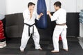 Two young men in kimono fighting- ashihara karate Royalty Free Stock Photo