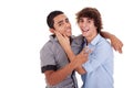 Two young men laughing and hugging, Royalty Free Stock Photo