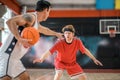 Two young men playing basketball and feeling excited Royalty Free Stock Photo