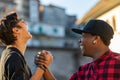 Two young men sharing a good joke laughing together Royalty Free Stock Photo