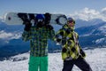 Two young men on top of a mountain. T Royalty Free Stock Photo