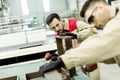 Two young men working in a factory Royalty Free Stock Photo