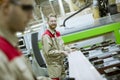 Two young men working in the furniture factory Royalty Free Stock Photo