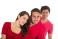 Two young men and a young girl dressed in red Royalty Free Stock Photo