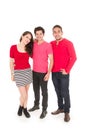 Two young men and a young girl dressed in red Royalty Free Stock Photo