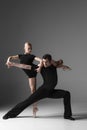 Two young modern ballet dancers on gray studio Royalty Free Stock Photo