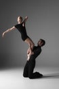 Two young modern ballet dancers on gray studio Royalty Free Stock Photo