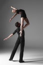 Two young modern ballet dancers on gray studio Royalty Free Stock Photo