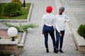 Two young modern fashionable, attractive, tall and slim african muslim womans in hijab or turban head scarf posed together Royalty Free Stock Photo