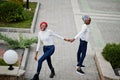 Two young modern fashionable, attractive, tall and slim african muslim womans in hijab or turban head scarf posed together Royalty Free Stock Photo