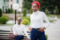 Two young modern fashionable, attractive, tall and slim african muslim womans in hijab or turban head scarf posed together Royalty Free Stock Photo