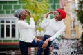 Two young modern fashionable, attractive, tall and slim african muslim womans in hijab or turban head scarf posed together Royalty Free Stock Photo