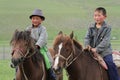 Two young mongolian riders
