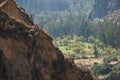 Two young native Andean boys looking at the Sacred Valley in Cusco, Peru, South America