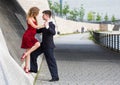 Two young people dancing tango somewhere in the city Royalty Free Stock Photo