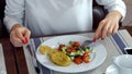 Two young people eating delicious business lunch Royalty Free Stock Photo