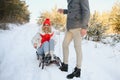 Two young people sliding on a sled Royalty Free Stock Photo