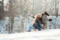 Two young people sliding on a sled Royalty Free Stock Photo