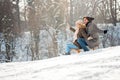 Two young people sliding on a sled Royalty Free Stock Photo