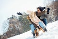 Two young people sliding on a sled Royalty Free Stock Photo