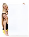 Young women with empty board for the text. Royalty Free Stock Photo