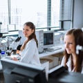 Two young researchers carrying out experiments in a lab Royalty Free Stock Photo