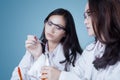 Two young scientists doing chemical research Royalty Free Stock Photo