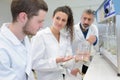 Two young students working on science project in lab Royalty Free Stock Photo