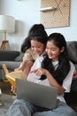 Two young teenage girls doing homework together and helping each other. Royalty Free Stock Photo