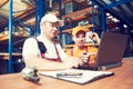 Workers in warehouse Royalty Free Stock Photo
