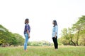 Two Young Woman ,Beautiful girl is relaxing lying on the grass i Royalty Free Stock Photo