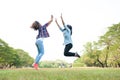 Two Young Woman ,Beautiful girl is relaxing lying on the grass i Royalty Free Stock Photo