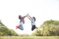 Two Young Woman ,Beautiful girl is relaxing lying on the grass i Royalty Free Stock Photo