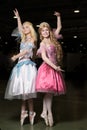 Two young woman cosplayer wearing beautiful dres