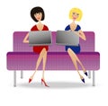 Two young woman with notebook sit on sofa Royalty Free Stock Photo