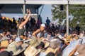 Two Young Women with the Best Seats in the Crowd at the 2022 New Orleans Jazz and Heritage Festival