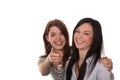 Two young women breaking into laughter Royalty Free Stock Photo